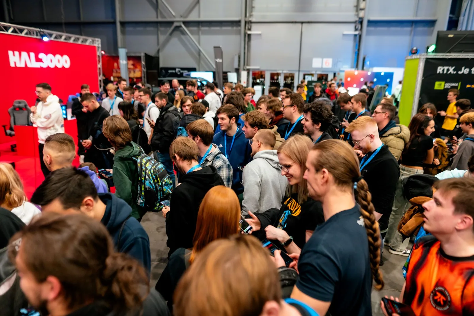 Visitors at the Czech National Championship gaming festival in 2024. People enjoying the program at the HAL3000 booth.